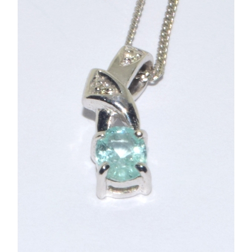 33 - 9ct white gold ladies Blue gemstone and Diamond pendant necklace on a 41cm 9ct gold chain