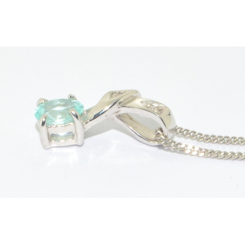 33 - 9ct white gold ladies Blue gemstone and Diamond pendant necklace on a 41cm 9ct gold chain