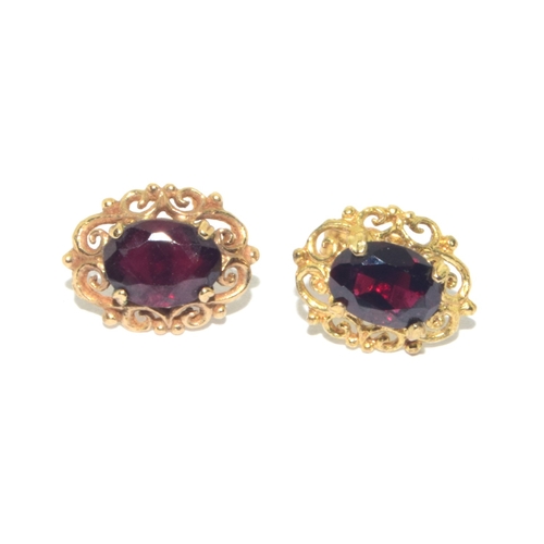 73 - 9ct gold antique garnet and earring suite of jewellery set in a scroll open work design on a 44cm 9c... 