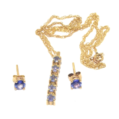 83 - 9ct gold ladies tanzanite 4 stone drop pendant with a pair of Tanzanite stud 9ct gold earrings on a ... 