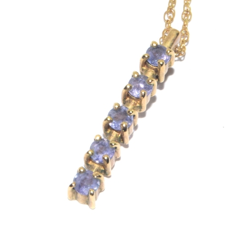 83 - 9ct gold ladies tanzanite 4 stone drop pendant with a pair of Tanzanite stud 9ct gold earrings on a ... 