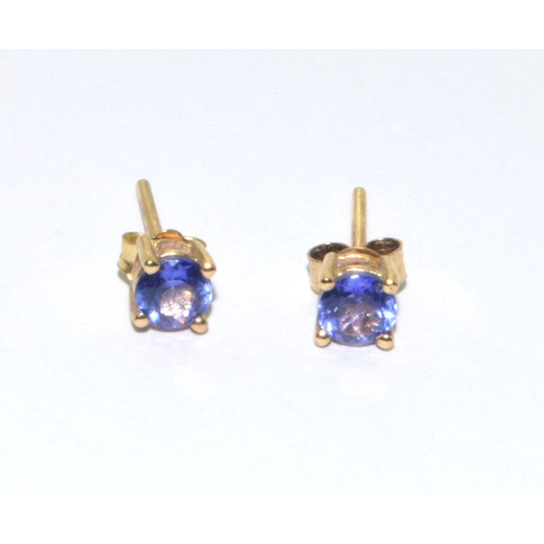 83 - 9ct gold ladies tanzanite 4 stone drop pendant with a pair of Tanzanite stud 9ct gold earrings on a ... 