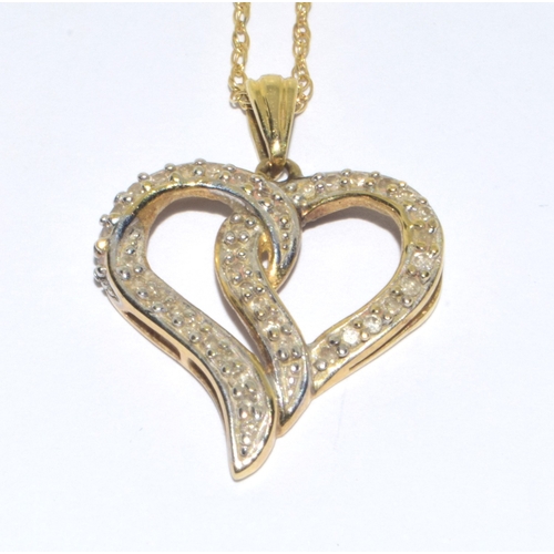 93 - 9ct gold ladies swept heart Diamond pendant necklace on a 42cm 9ct god chain