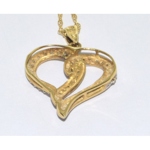 93 - 9ct gold ladies swept heart Diamond pendant necklace on a 42cm 9ct god chain