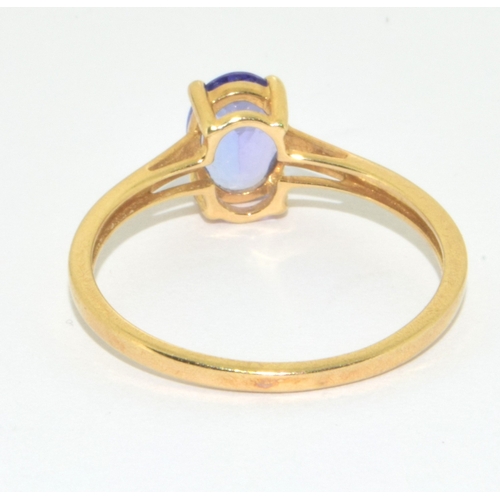 31 - 9ct gold ladies Amethyst ring in a claw boxed setting size R