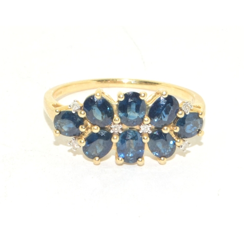 156 - 9ct gold ladies Tanzanite and accent Diamond twin row ring size S