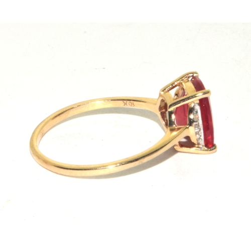 161 - 9ct gold ladies larger ruby and accent Diamond ring size S