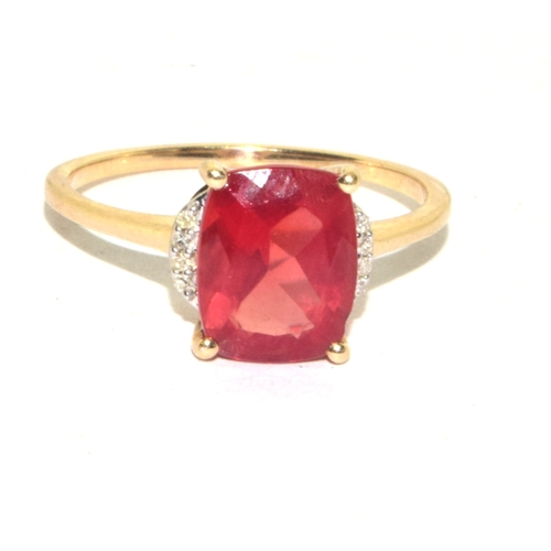 161 - 9ct gold ladies larger ruby and accent Diamond ring size S