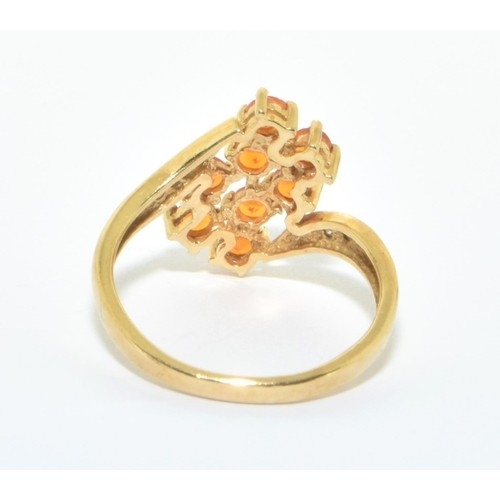 56 - 9ct gold ladies Amber and Diamond twist design ring size L