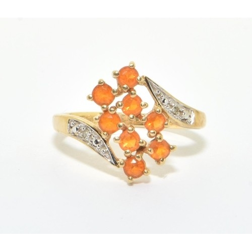 56 - 9ct gold ladies Amber and Diamond twist design ring size L