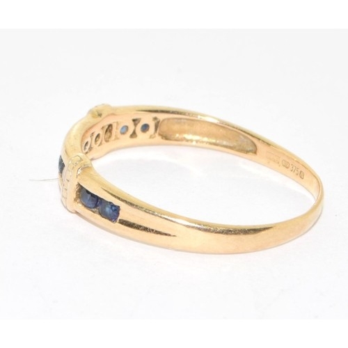 86 - 9ct gold ladies sapphire channel set ring size O