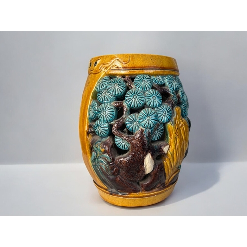 30 - A Chinese ceramic barrel-shape stool.Sancai glazed, decorated with a 'Tiger' amongst Pines.37 x 28cm... 