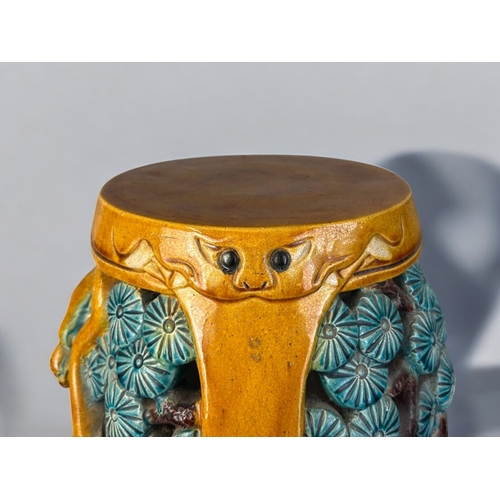 30 - A Chinese ceramic barrel-shape stool.Sancai glazed, decorated with a 'Tiger' amongst Pines.37 x 28cm... 