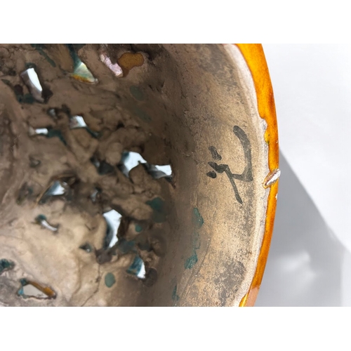 30 - A Chinese ceramic barrel-shape stool.Sancai glazed, decorated with a 'Tiger' amongst Pines.37 x 28cm... 