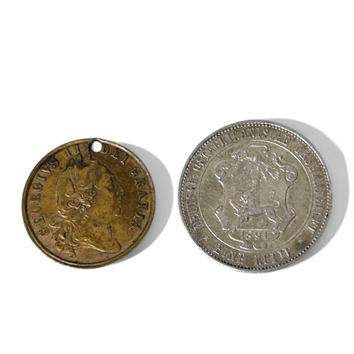 12 - An 1891 German East African 'One Rupie' coin.Together with a Guinea gaming token.