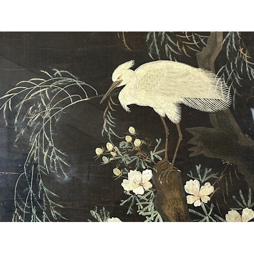39 - A large Japanese silk embroidery panel.Meiji period. Depicting Cranes in a tree. Framed.104 x 74cm (... 