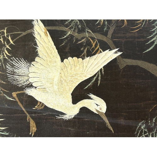 39 - A large Japanese silk embroidery panel.Meiji period. Depicting Cranes in a tree. Framed.104 x 74cm (... 