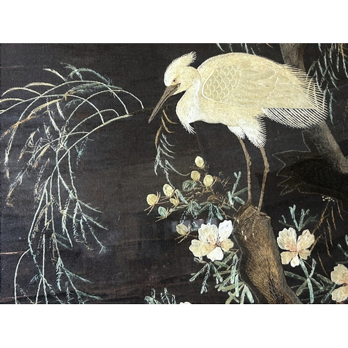 39 - A large Japanese silk embroidery panel.Meiji period. Depicting Cranes in a tree. Framed.104 x 74cm (... 