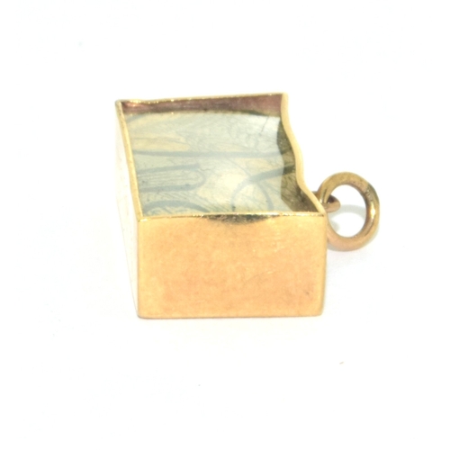 298 -  9ct gold emergency money £1 charm