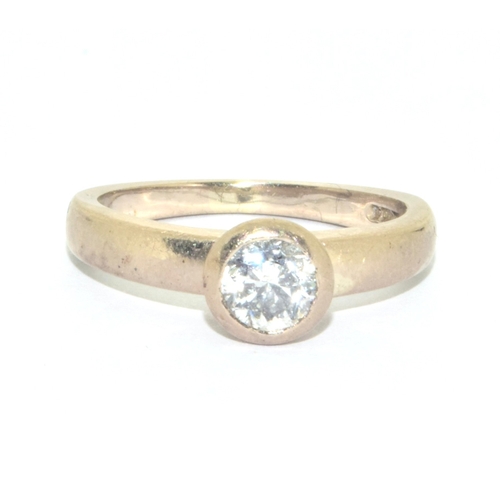 301 - 18ct gold ladies Diamond solitaire ring of approx 0.33ct in an enclosed setting size L