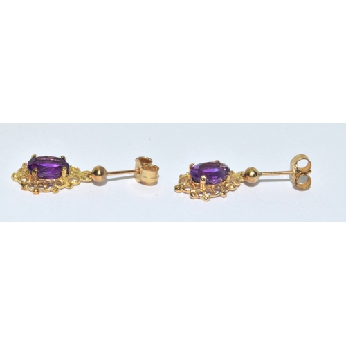 58 - 9ct gold Amethyst suite of jewellery comprising an Amethyst pendant necklace on a 9ct gold chain tog... 