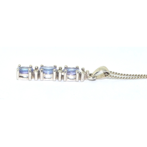 98 - 9ct white gold Diamond and Tanzanite drop pendant necklace on a 40cm 9ct white gold chain 