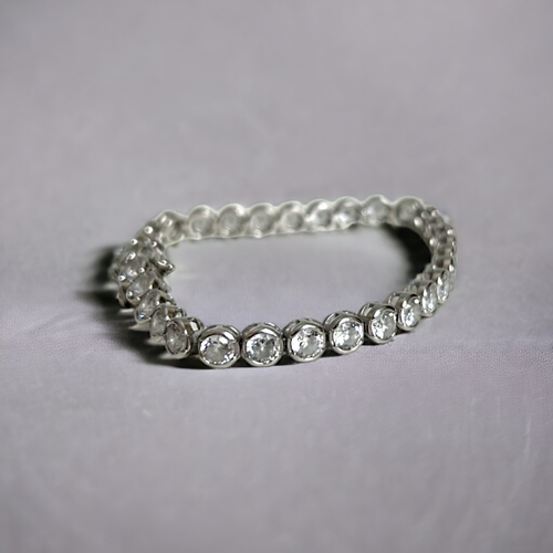 308 - A 925 Silver tennis bracelet.Length - 7