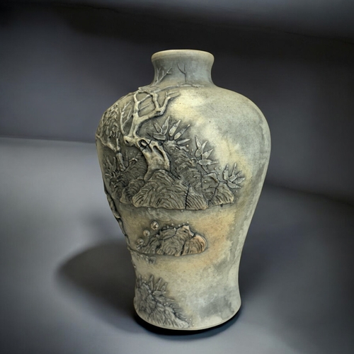 45 - A Chinese relief decorated biscuit porcelain vase.In the Wang Bingrong style.Height - 14cm... 