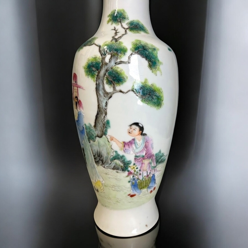 48 - A Chinese Famille Rose porcelain vase.Republic period. Finely painted in overglaze enamels.Height - ... 