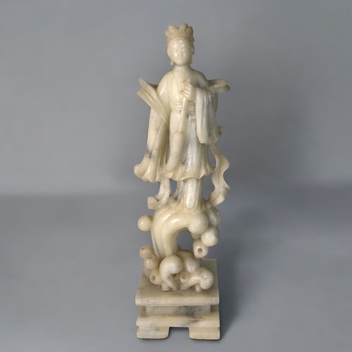 383 - A collection of Chinese carved stone figures and seals.Tallest - 27cm