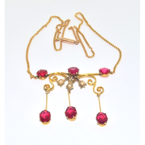 318 - Superb vintage Art Noveau Ruby and Pearl drop down pendant necklace on a 9ct gold 40cm chain in a vi... 