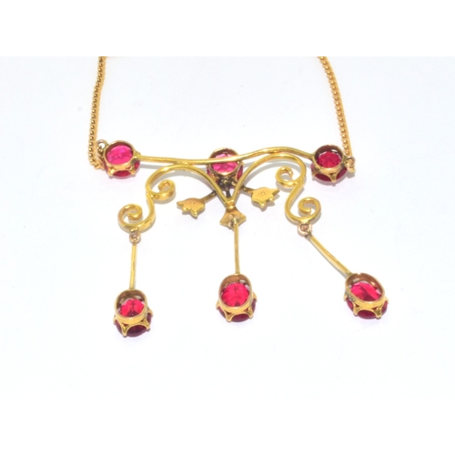 318 - Superb vintage Art Noveau Ruby and Pearl drop down pendant necklace on a 9ct gold 40cm chain in a vi... 