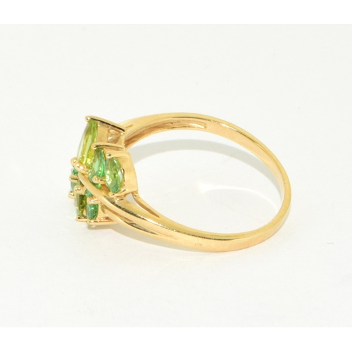 41 - 9ct gold ladies peridot and gem stone leaf design statement ring size S