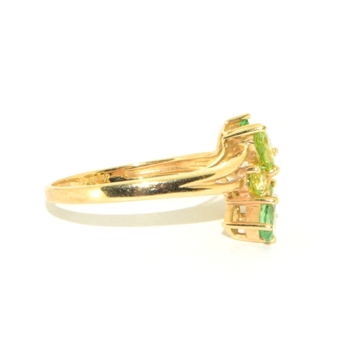 41 - 9ct gold ladies peridot and gem stone leaf design statement ring size S