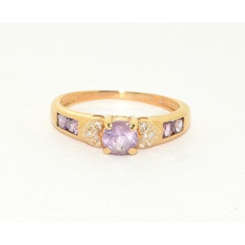 46 - 9ct gold ladies Amethyst ring with Amethyst shoulders and accent diamond decoration size M