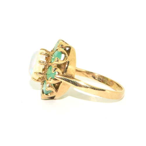 61 - 9ct gold ladies vintage Emerald and Opal cluster ring held in a box claw setting size K