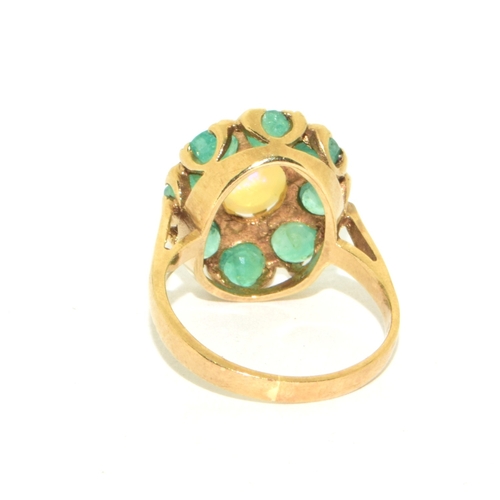 61 - 9ct gold ladies vintage Emerald and Opal cluster ring held in a box claw setting size K