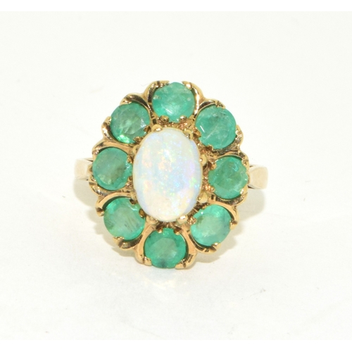 61 - 9ct gold ladies vintage Emerald and Opal cluster ring held in a box claw setting size K