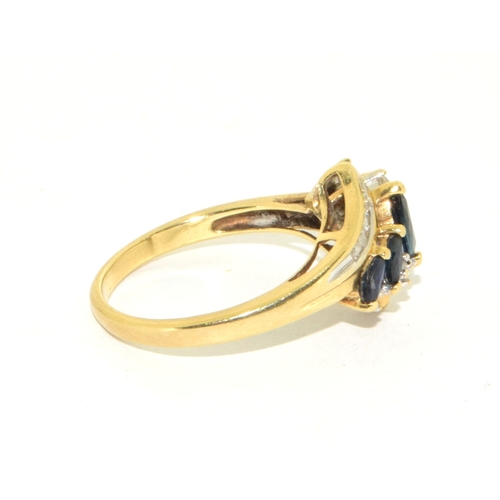 66 - 9ct gold ladies Diamond and Sapphire twist design ring size O