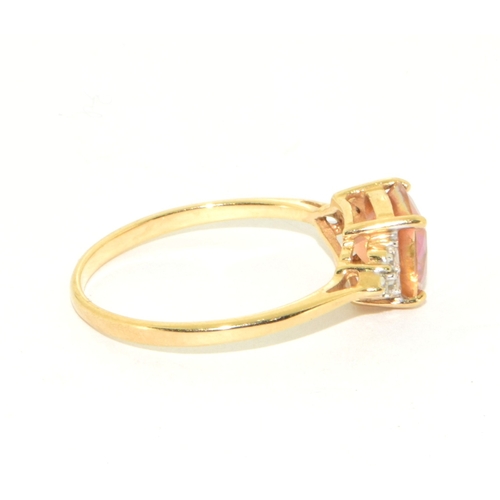 71 - 9ct gold ladies facet faced Amber coloured ring with accent diamond shoulders size R