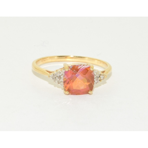 71 - 9ct gold ladies facet faced Amber coloured ring with accent diamond shoulders size R