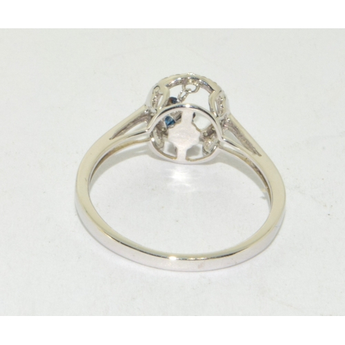 78 - 14ct white gold ladies Diamond halo mount ring with a floating blue diamond size O