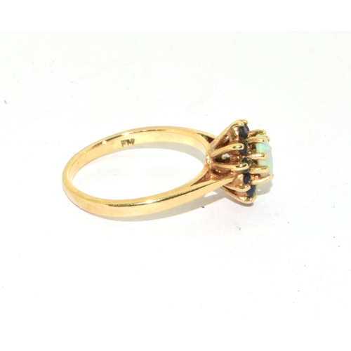 96 - 9ct gold ladies vintage Opal and Sapphire cluster ring set in an open claw setting size K