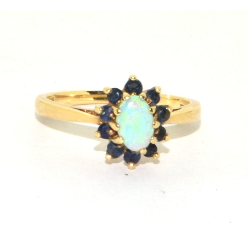 96 - 9ct gold ladies vintage Opal and Sapphire cluster ring set in an open claw setting size K