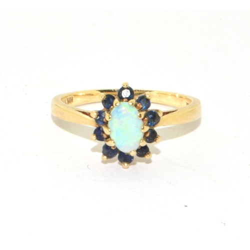 96 - 9ct gold ladies vintage Opal and Sapphire cluster ring set in an open claw setting size K