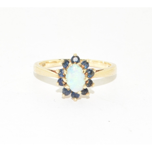 96 - 9ct gold ladies vintage Opal and Sapphire cluster ring set in an open claw setting size K