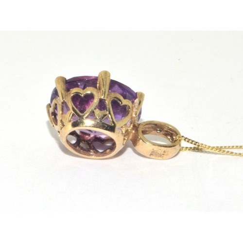 98 - 9ct gold oval cut Amethyst and Diamond pendant necklace on a 9ct gold chain of 42cm