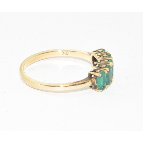 111 - 9ct gold ladies 5 stone Emerald ring size N