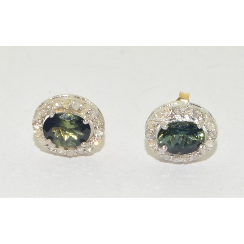 115 - Pair of natural green Tourmaline and  Diamond cluster earrings sterling silver fronts and marked as ... 