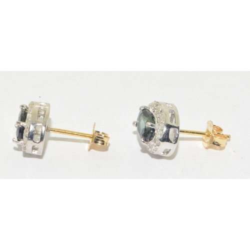 115 - Pair of natural green Tourmaline and  Diamond cluster earrings sterling silver fronts and marked as ... 